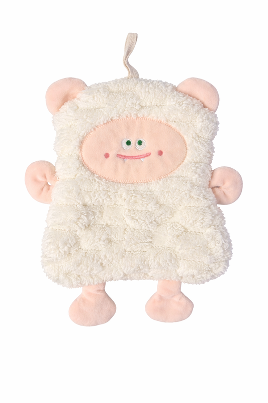 Doudou personnalisé blanc dans lit bébé fille